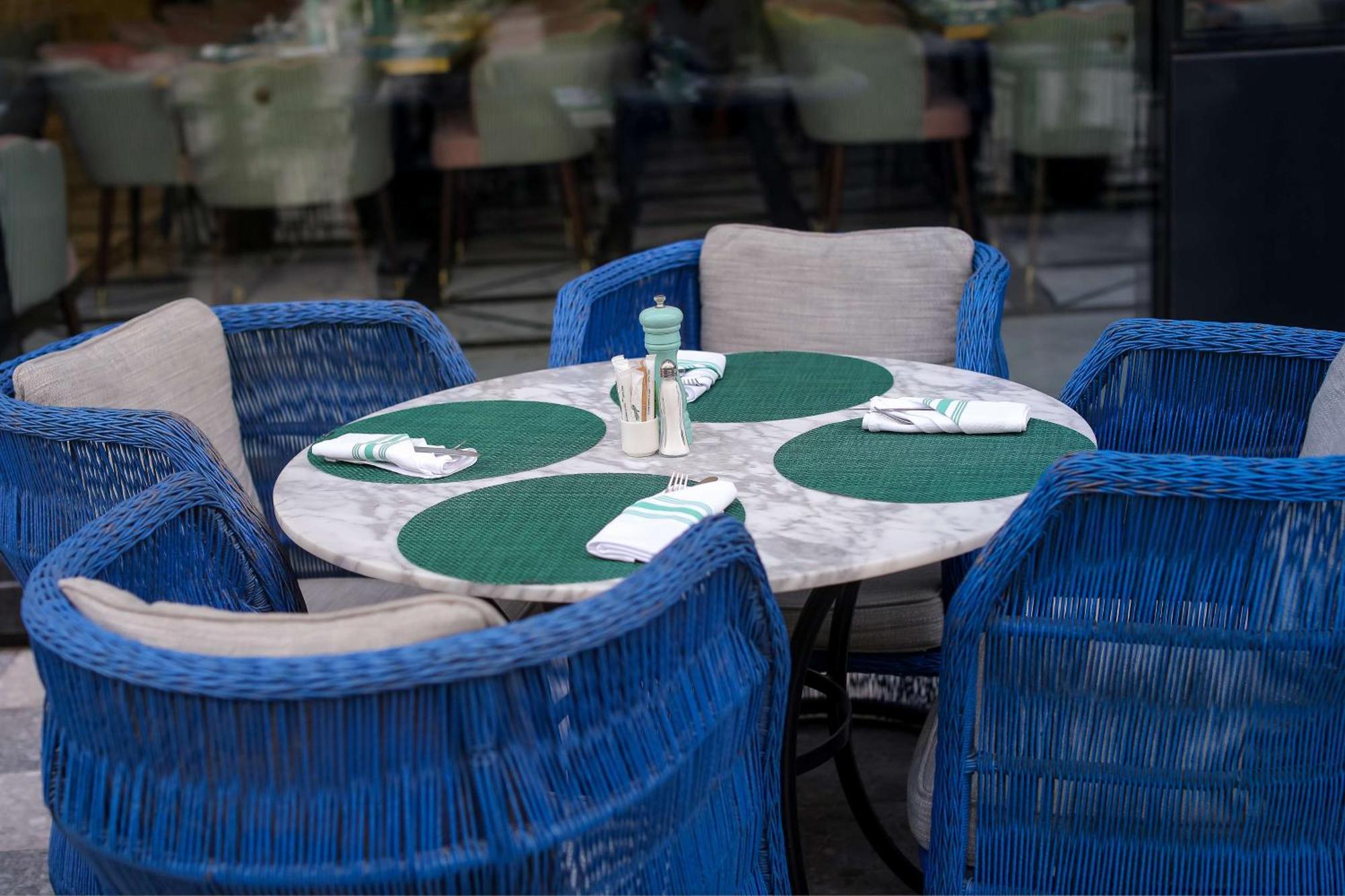 Mansard Riyadh, A Radisson Collection Hotel 외부 사진 A table with placemats